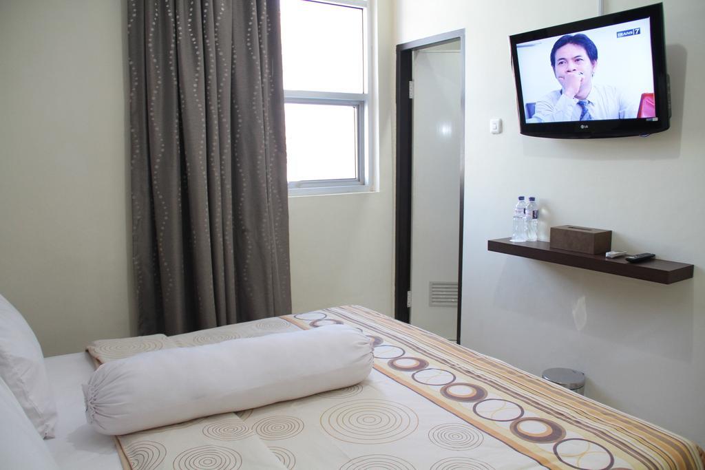 Vindhika Hotel Макасар Номер фото